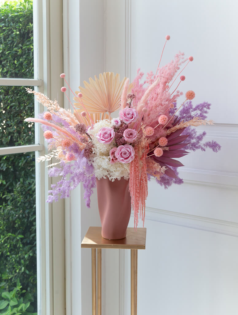 dried flower arrangement in vase