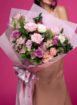 Bouquet of purple and pink roses
