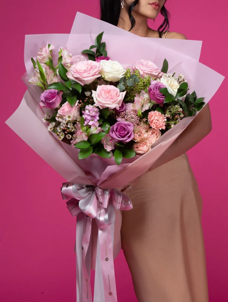 Bouquet of purple and light pink roses