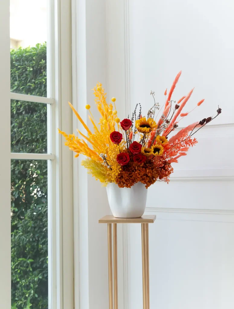 Funfetti dried flower in vase with wild sugarcane, rabbit’s tail, and gypsy flowers