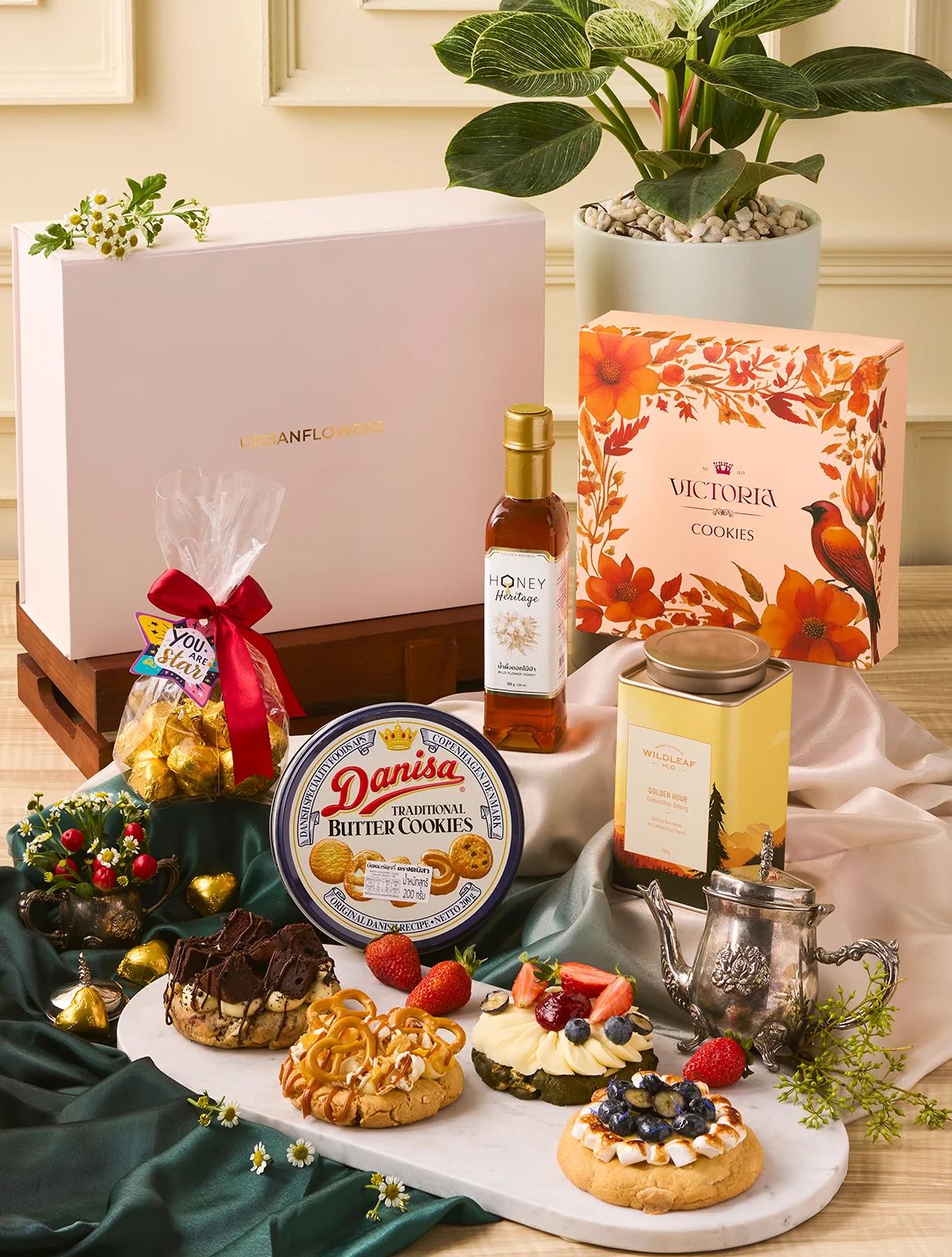 Tea & Cookies Affair Hamper with oolong tea, gourmet cookies, honey & chocolates by UrbanFlowers.
