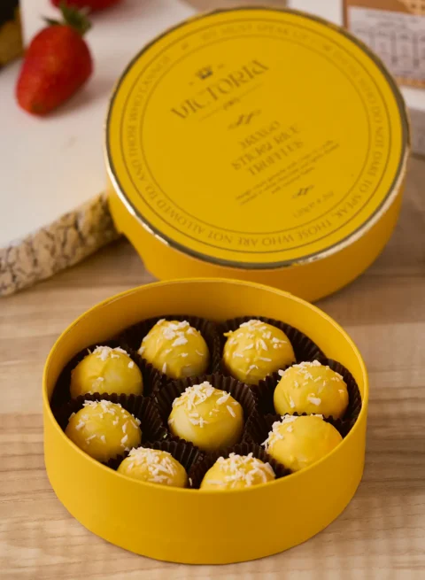 Victoria Mango Sticky Rice Truffles — handcrafted Belgian truffles inspired by Thai dessert.