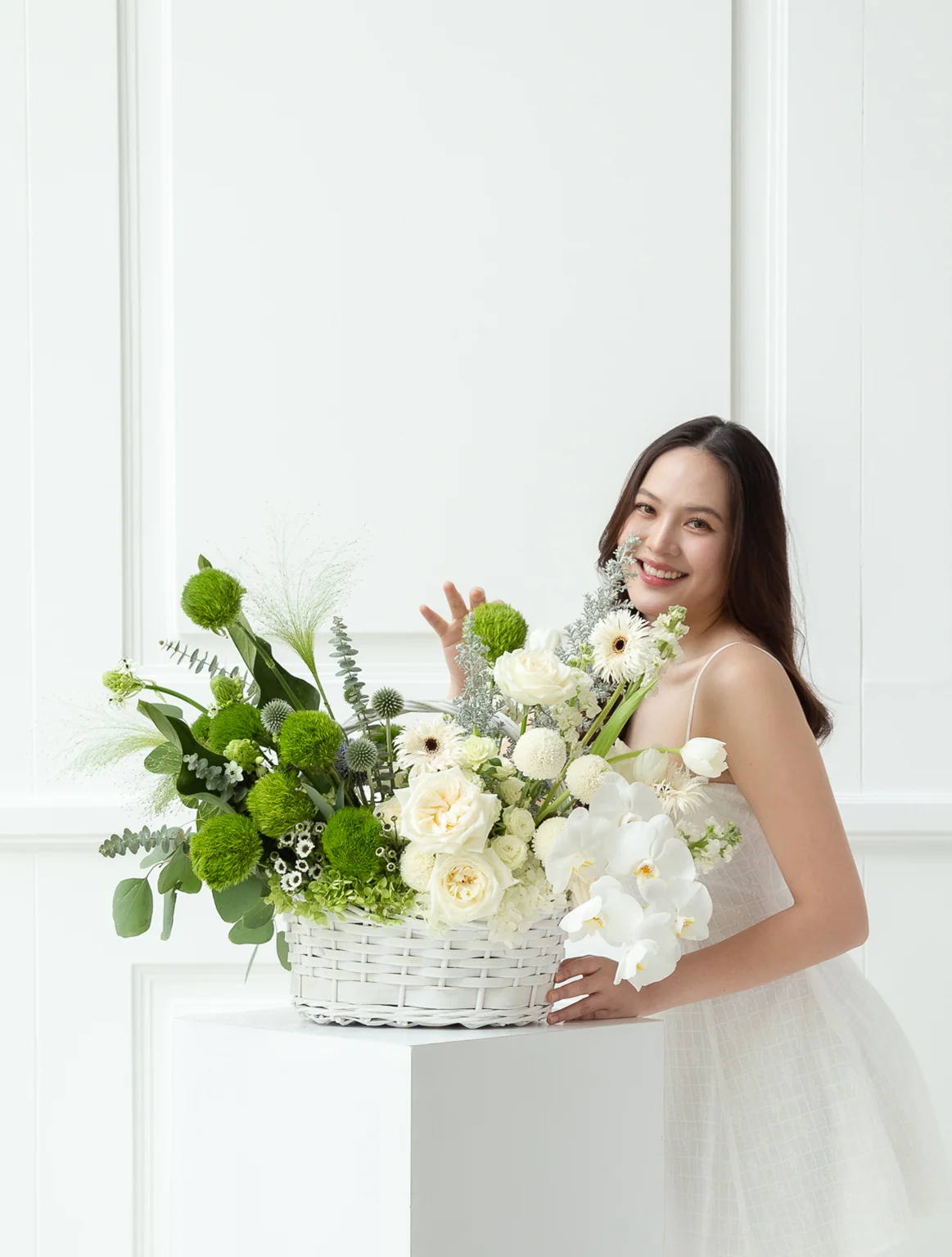 Elegant green and white flower basket