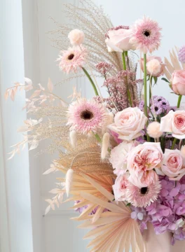 Light pink vase of fresh flowers