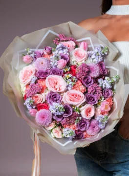 Bouquet of tulips and purple roses